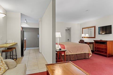 Suite, 1 King Bed, Smoking, Kitchenette | Desk, blackout drapes, rollaway beds, free WiFi