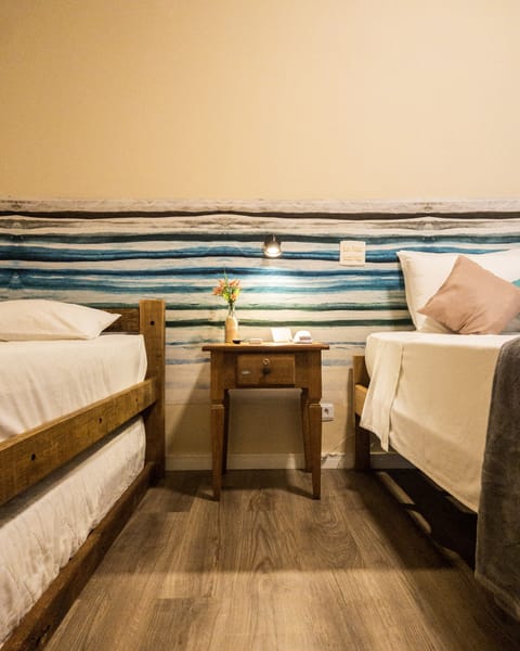 Quadruple Room | Minibar, iron/ironing board, free WiFi, bed sheets