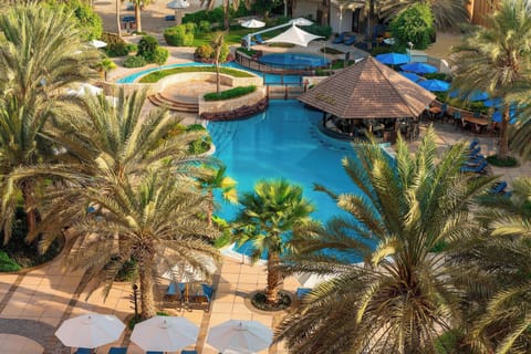 3 outdoor pools, open 8:00 AM to 10:00 PM, pool umbrellas, sun loungers