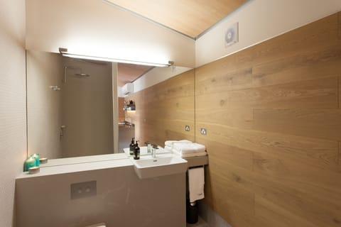 Studio 1 | Bathroom | Shower, rainfall showerhead, designer toiletries, hair dryer