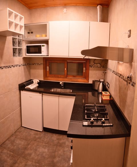 Deluxe Triple Room, 1 Bedroom, Patio, Garden View | Private kitchen | Fridge, microwave, electric kettle, paper towels