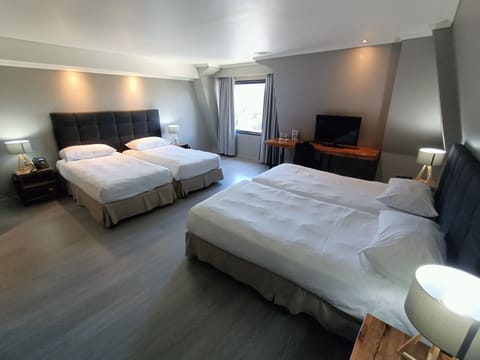 Standard Quadruple Room | Minibar, in-room safe, free WiFi, bed sheets