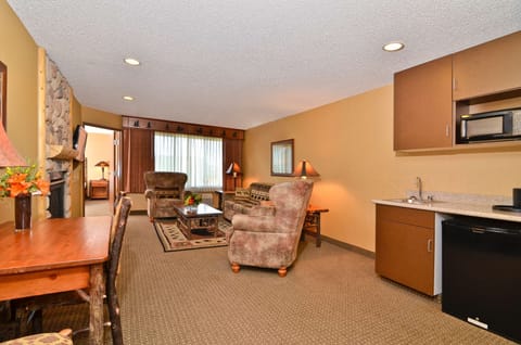 Suite, 1 King Bed, Non Smoking, Jetted Tub (Woodland Mist Room) | Pillowtop beds, desk, laptop workspace, blackout drapes