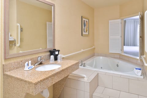 Room, 1 King Bed | Bathroom | Hair dryer, towels