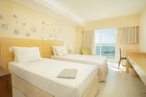 Standard Room, 2 Twin Beds, Balcony, Ocean View | Minibar, in-room safe, desk, blackout drapes