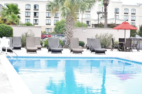 Seasonal outdoor pool, open 10:00 AM to 10:00 PM, sun loungers