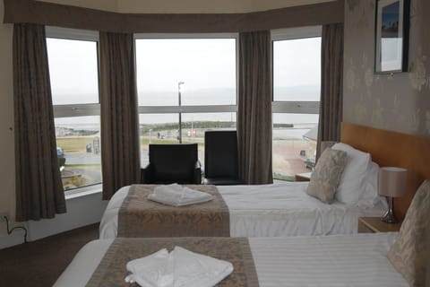 Double or Twin Room, Sea View | Desk, iron/ironing board, free WiFi, bed sheets