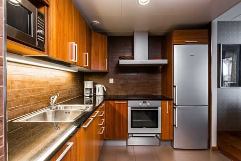 Superior Suite, 2 Bedrooms, Sauna | Private kitchen | Full-size fridge, microwave, oven, stovetop