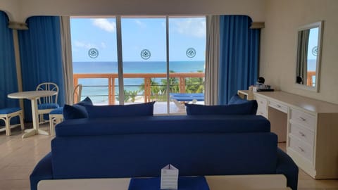 Deluxe Panoramic , Ocean View | Living area | 32-inch flat-screen TV with cable channels, TV, foosball