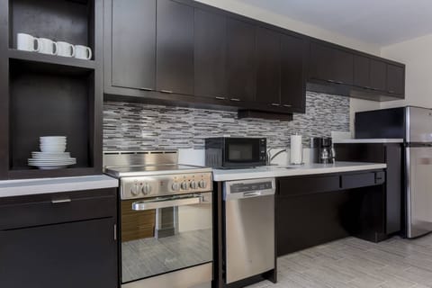 Suite, 1 Bedroom | Private kitchen | Full-size fridge, microwave, oven, stovetop