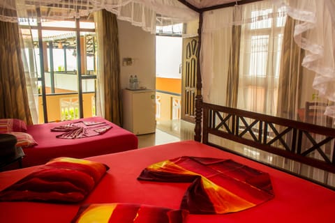 Deluxe Triple Room, Sea View | Premium bedding, minibar, in-room safe, individually decorated