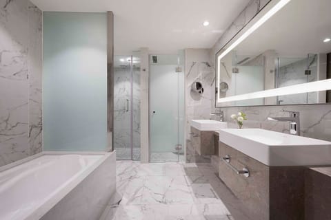 Premier Suite, 1 King Bed | Bathroom | Hair dryer, slippers, towels, shampoo