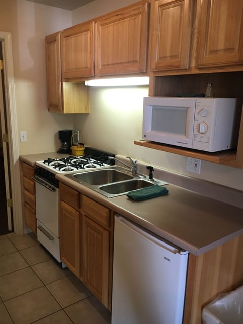 Suite, 1 Bedroom | Private kitchen | Fridge, microwave, oven, stovetop