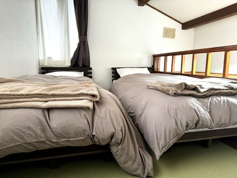 Japanese-Style Room 107 ft2 with 54 ft2 loft, Private Toilet and Shared Bath(No car parking) | Down comforters, in-room safe, free WiFi, bed sheets