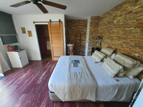 Double Room CUBA, Garden View | Minibar, individually furnished, soundproofing, rollaway beds