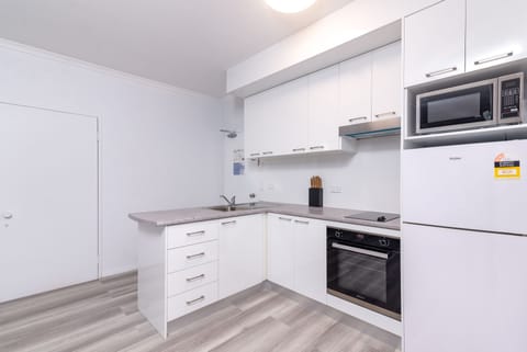 One Bedroom Apartment Ground Floor | Private kitchen | Fridge, microwave, oven, stovetop