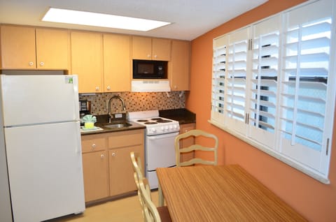 Suite, 1 Bedroom (3 queens- 5B) | Private kitchen | Fridge, microwave, freezer