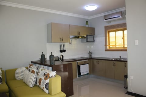 Deluxe Apartment, 2 Bedrooms (Suite) | Private kitchen | Fridge, coffee/tea maker, electric kettle