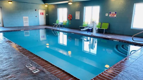 Indoor pool, open 7:00 AM to 11:00 PM, sun loungers