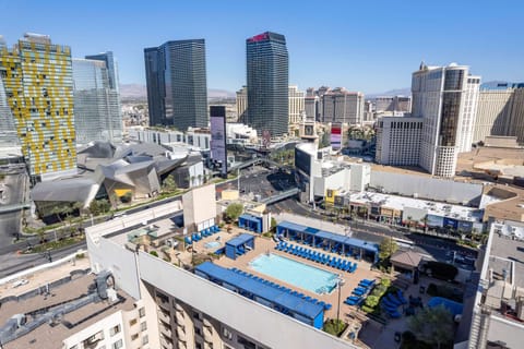 Seasonal outdoor pool, open 8:00 AM to 10:00 PM, pool umbrellas