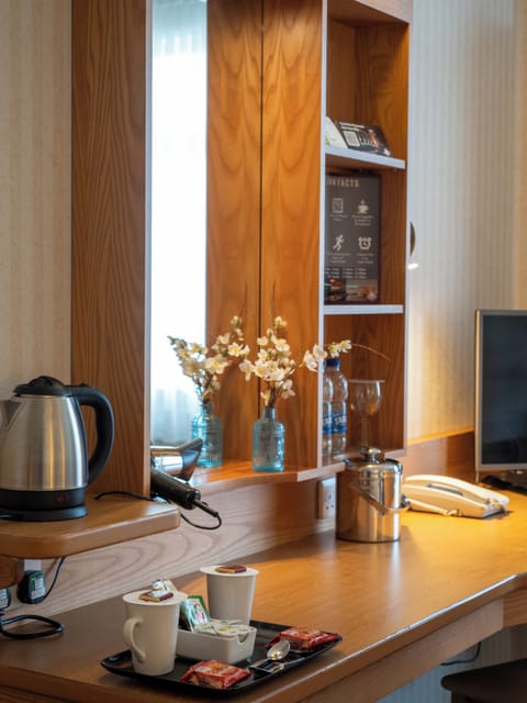 In-room safe, desk, iron/ironing board, free cribs/infant beds