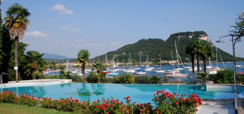 Seasonal outdoor pool, pool umbrellas, sun loungers