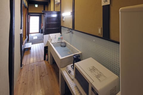 Japanese Style Townhouse - Ichi-no-tsubone | Private kitchen | Microwave, stovetop, electric kettle, cookware/dishes/utensils