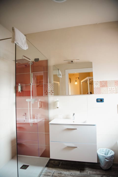 Junior Quadruple Room, 1 Bedroom | Bathroom | Shower, free toiletries, hair dryer, bidet