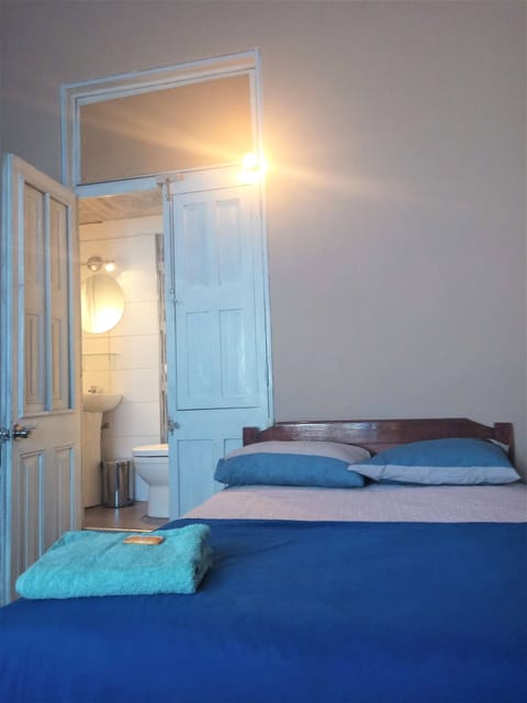 Classic Quadruple Room, 4 Bedrooms, Private Bathroom, Ground Floor | Desk, iron/ironing board, free WiFi, bed sheets