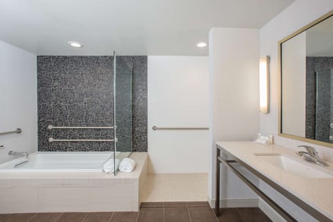 Suite, 1 King Bed, Accessible (Hearing) | Bathroom | Shower, towels