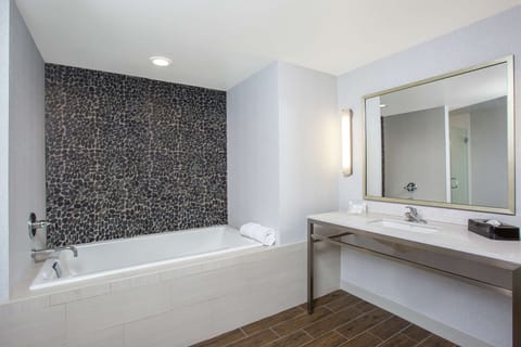 Suite, 1 King Bed, Non Smoking | Bathroom | Shower, towels