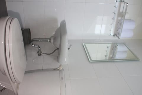 Shower, free toiletries, hair dryer, slippers