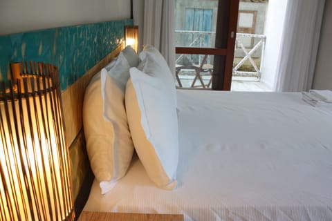 Standard Queen Varanda | Minibar, blackout drapes, free WiFi, bed sheets