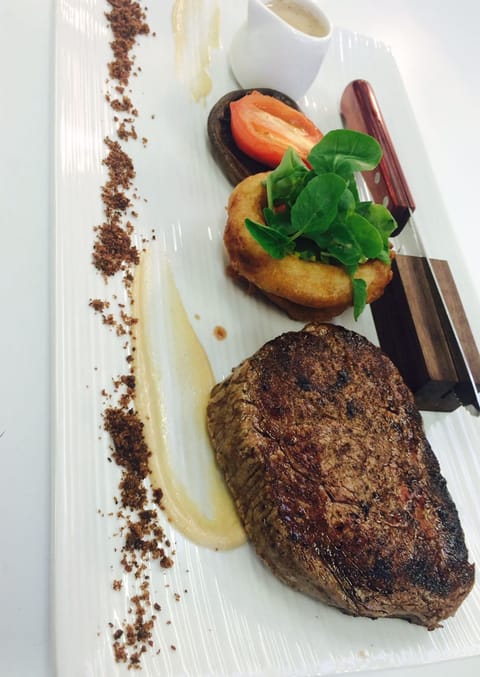 Breakfast, lunch, dinner served; local cuisine 