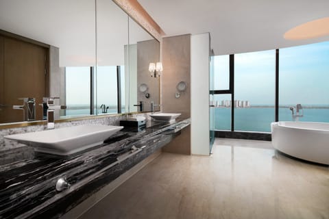 Club Suite, 1 Bedroom | Bathroom | Separate tub and shower, designer toiletries, hair dryer, bathrobes