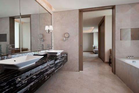 Club Suite, 1 Bedroom | Bathroom | Separate tub and shower, designer toiletries, hair dryer, bathrobes