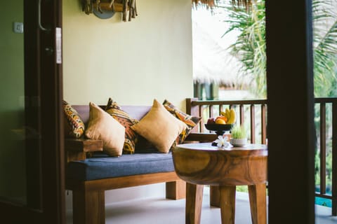 Tropical Deluxe  Room Pool View | Balcony