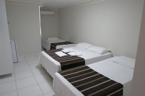 Standard Quadruple Room | Minibar, free WiFi, bed sheets