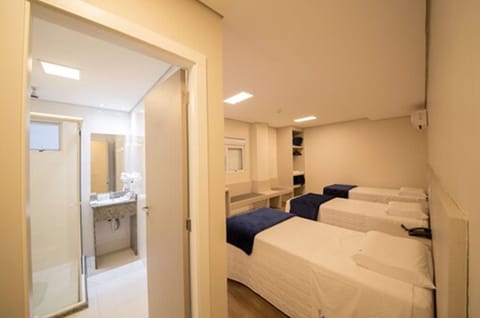 Standard Triple Room, Multiple Beds | Bathroom | Shower, free toiletries, hair dryer, towels