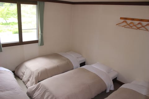 Quadruple Room, 4 Bedrooms, Non Smoking, Shared Bathroom | Desk, free WiFi, bed sheets