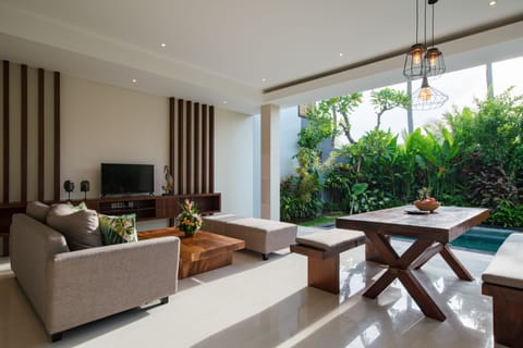 Premier Villa, 1 Bedroom | Living area | 32-inch flat-screen TV with cable channels, LCD TV