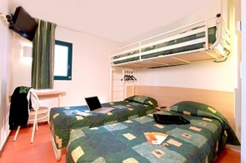 Standard Room, Multiple Beds (1 Double and 1 Single bed) | Desk, laptop workspace, blackout drapes, iron/ironing board