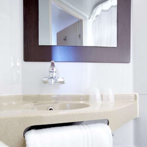 Shower, eco-friendly toiletries, towels, soap