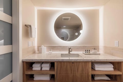 Premium Double Queen | Bathroom | Combined shower/tub, eco-friendly toiletries, hair dryer, towels