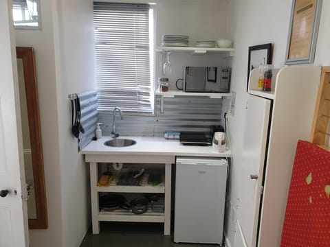 Basic Studio, 1 Queen Bed | Private kitchen | Fridge, microwave, stovetop, electric kettle
