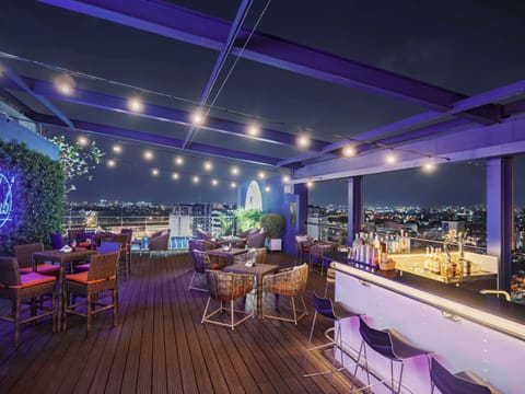 Rooftop bar, pool views, open daily
