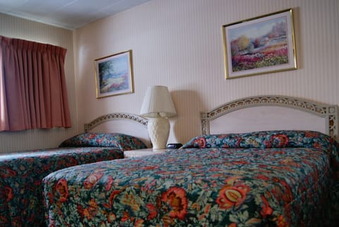 Standard Room, 2 Queen Beds | Pillowtop beds, desk, free WiFi, bed sheets