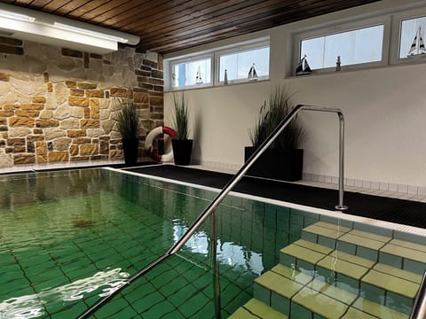 Indoor pool, open 10:00 AM to 8:00 PM, sun loungers