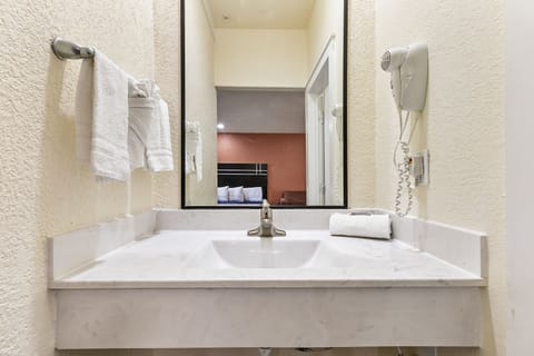 Double King Family Room | Bathroom | Free toiletries, hair dryer, towels, soap