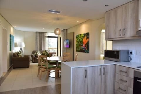 Apartment, 3 Bedrooms, Garden Area | Private kitchen | Full-size fridge, microwave, oven, stovetop